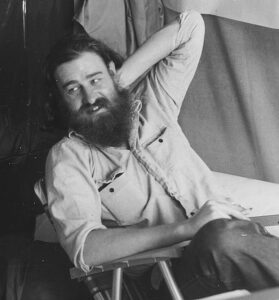 Life Member Jon Bartlett seated and smiling, part of VFSS history 1968–2002